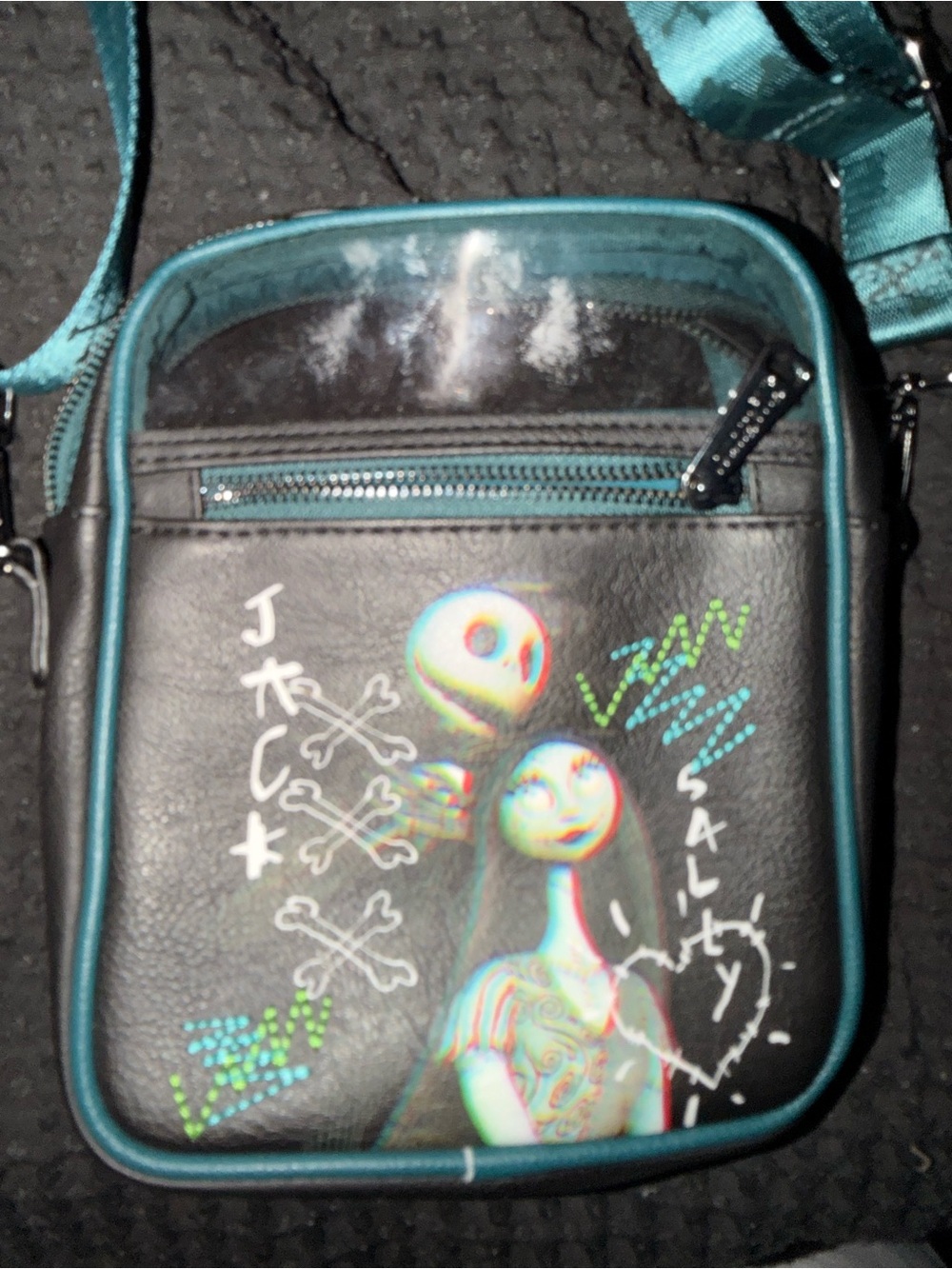 Loungefly Black Crossbody with Teal Trim and Colorful Character Art